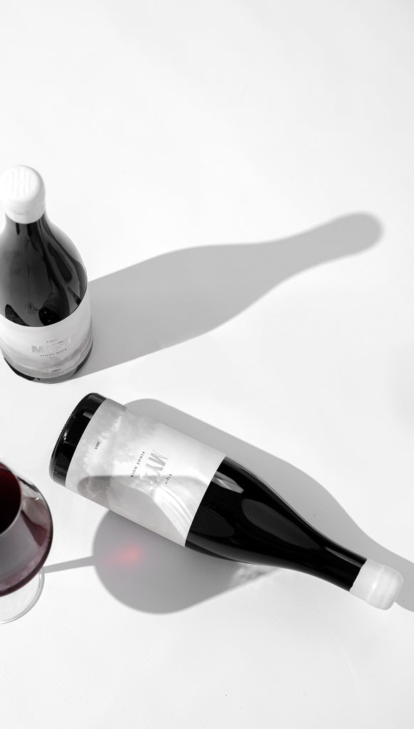 Harry Hartman Myst and red wine glass pinot noir